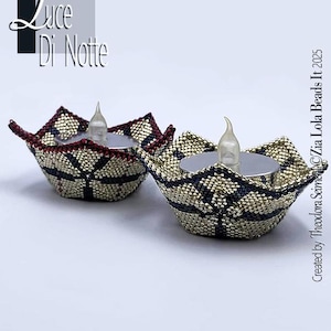 May include: Two beaded candle holders with LED candles. The holders are gold, navy, and burgundy, with a floral design. The text "Luce Di Notte" is in the upper left corner. The text "Created by Theodora Seimei ©Zia Lola Beads It 2025" is on the right side.