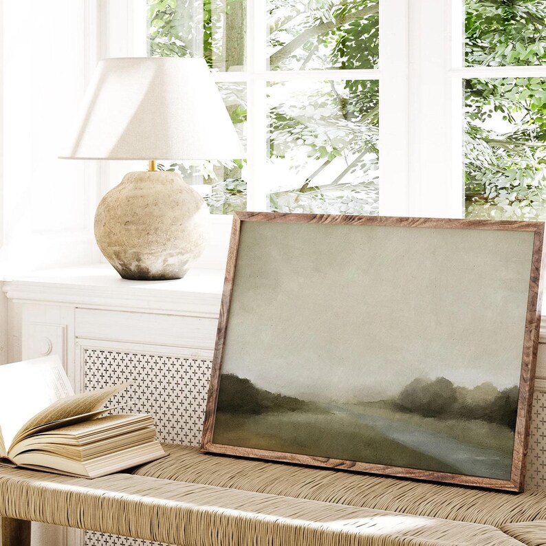 Nature wall art featuring a peaceful misty forest with soft texture and light grey-green palette, styled for quiet, minimalist interiors.