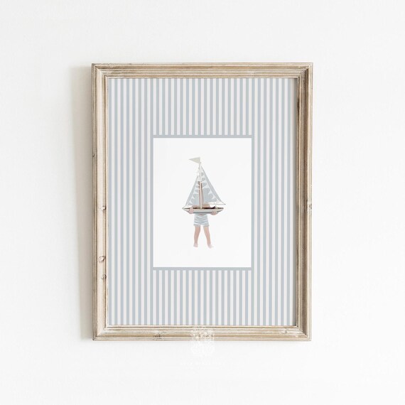 Boy with Striped Toy Sailboat Wall Art: Blue Nautical Illustration