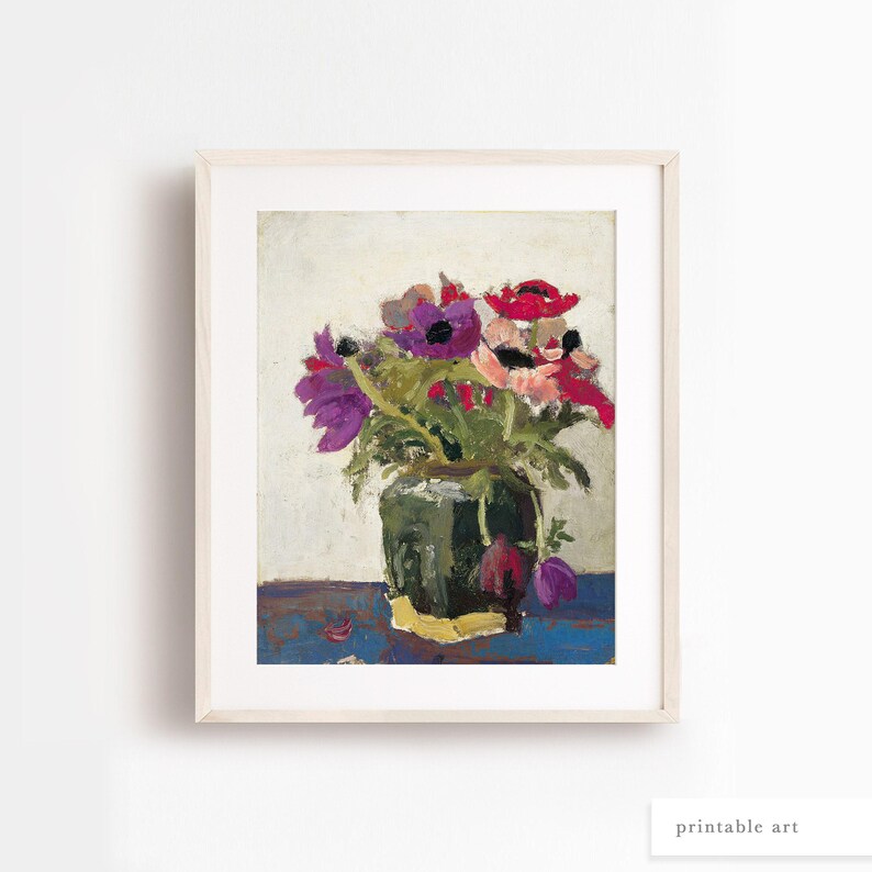 Still life flower artwork with vintage appeal, displayed as part of a gallery wall arrangement.
