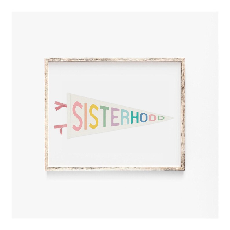 Sisterhood pennant flag print in a neutral frame, modern girl power decor, printable feminist artwork for stylish spaces.