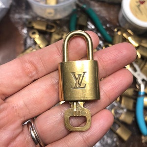 Authentic Louis Vuitton lock and key set