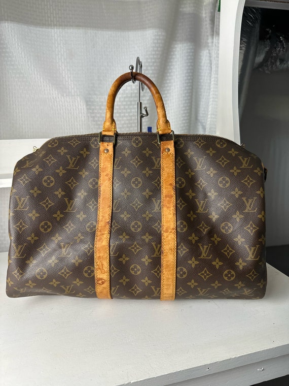 Authentic Louis Vuitton Keepall Bandouliere 50