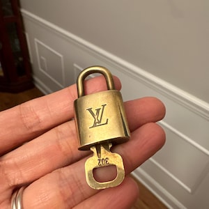 Authentic Louis Vuitton lock and key set
