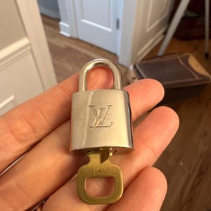 Authentic Louis Vuitton lock and key set