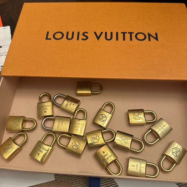 10 authentic Louis Vuitton locks. NO KEYS.