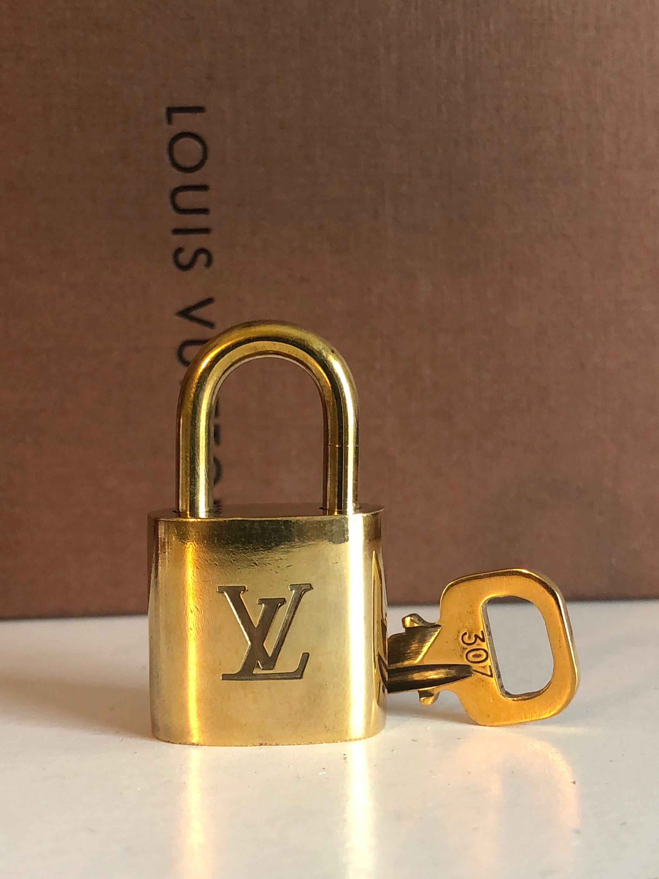 10 Louis Vuitton Locks. NO KEYS 