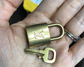 Authentic Louis Vuitton lock and key set