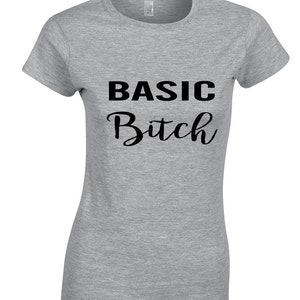 May include: Grey t-shirt with black text that reads "BASIC Bitch" in a cursive font.