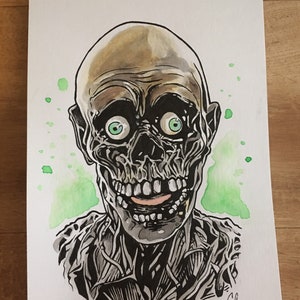 May include: A black and white illustration of a skeletal figure with green eyes and a wide, toothy grin. The figure is drawn in a cartoon style with a watercolor background.