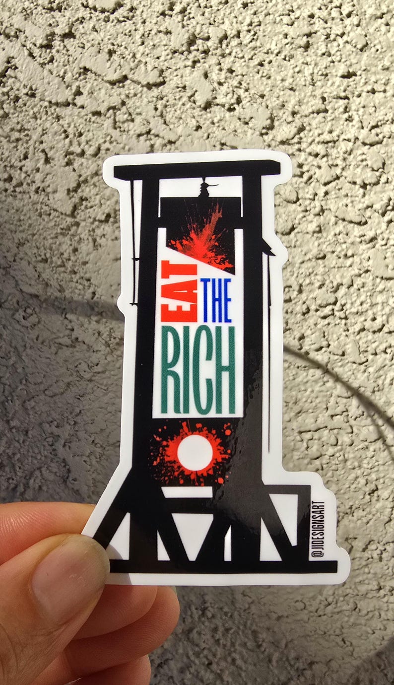 May include: Black and white sticker of a guillotine with red blood splatter and the text "Eat the Rich" in red, green, and blue. The sticker has a white border and the text "@JIDESIGNART" in the bottom right corner.