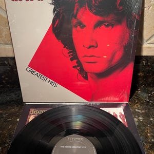The Doors - Greatest Hits EX Condition Shrink - Jim Morrison Classic Rock - Frete grátis - Frete grátis!