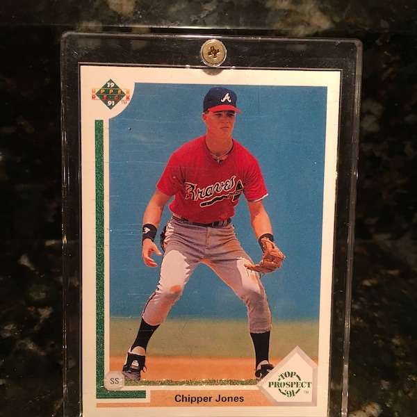 1991 Upper Deck Chipper Jones Rookie Card RC- Must have collectible! Near Mint/Mint Condition & Free Case! Atlanta Braves Legend!