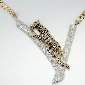 Large Jaguar  in 14kt Yellow Gold on 14kt White Gold Tree Branch.