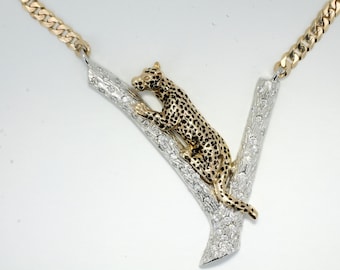 Large Jaguar  in 14kt Yellow Gold on 14kt White Gold Tree Branch.