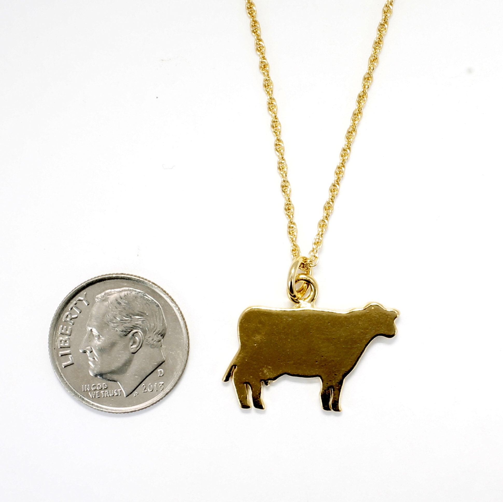 Gold cow best sale necklace