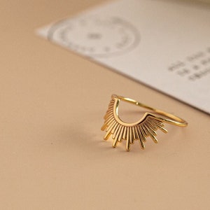 Sunburst ring with extended rays, like a sunrise in 24k gold-plated sterling silver