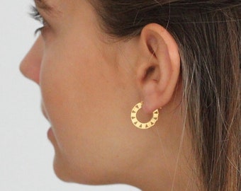 Flat hoop earrings with triangle-shaped perforations in sterling silver or gold plated