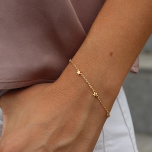 Bracciale con piccole STELLE in argento 925 e argento placcato oro 24k immagine 1