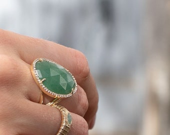 Ring with large aventurine stone with zircon finish made of sterling silver and gold plating