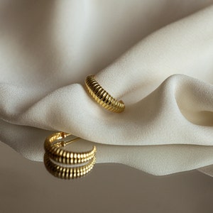 Twisted semi-hoop earrings in 24-karat yellow gold-plated sterling silver