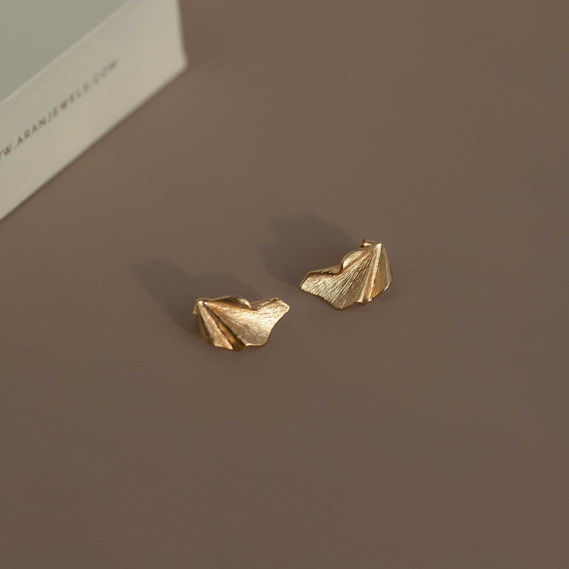 Beautiful lily petal shaped earrings for guests or special occasions made of gold plated sterling silver