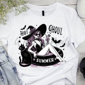 May include: White t-shirt with a black and white illustration of a witch wearing sunglasses and a witch hat, floating in a pool with a black cat and a cocktail. The text "Hot Ghoul Summer" is printed on the shirt.