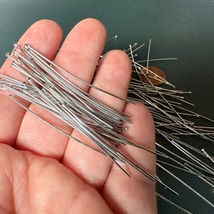 Sturdy, American made Rhodium plated brass headpins! Sold per pack of 100 headpins. SKU 02208