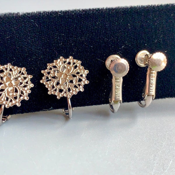 These are vintage Miriam Haskell clip on earrings! Signed on the clip back as well as on the reverse of the filigree base!