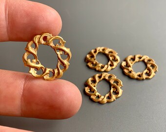 Unusual vintage, new old stock brass stamping. Thick brass in a wreath shape, custom plated.