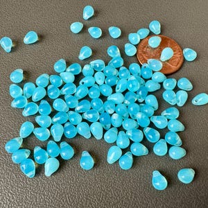 GORGEOUS aqua blue opal Czech glass drops! Sold per 50 beads. SKU 09621