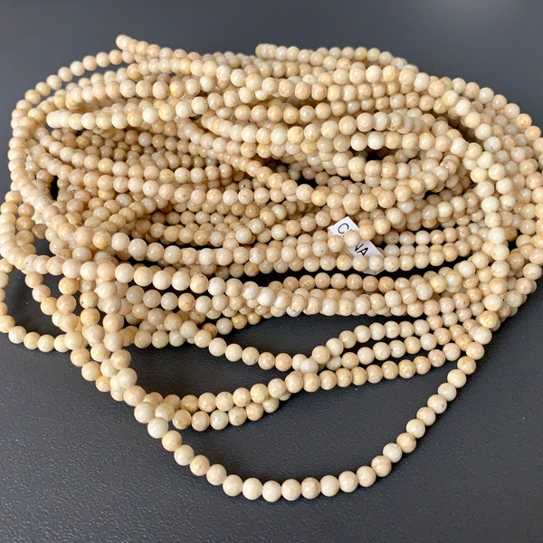 Lovely natural River Stone rounds! Extra long strands!