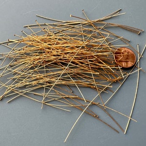 Extra long 24 gauge gold plated brass headpins! From Rhode Island. Sold per pack of 100 pieces. SKU 15312
