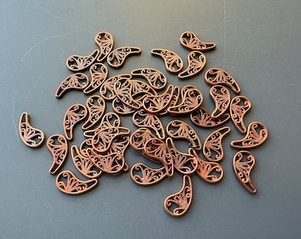 Unique vintage filigree paisleys! Copper plated brass filigree. Sold per lot of 25 pieces. SKU 16105