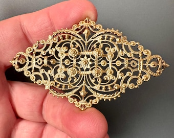 Truly beautiful vintage filigree. Very sturdy-- yet a delicate and intricate design. Sold per piece. SKU 13603