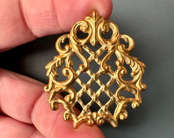 美しい織り模様と渦巻き模様が特徴的な、ヴィンテージの真鍮製スタンプ