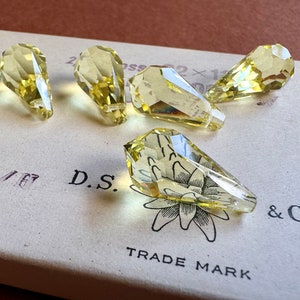 Vintage Swarovski crystal drops/pendants in pristine condition!  Article 6000 in Jonquil. Nice LARGE size too. Sold per pair. SKU 15713