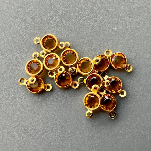 Gorgeous vintage topaz channel set Swarovski chatons! Set in double looped brass connectors!