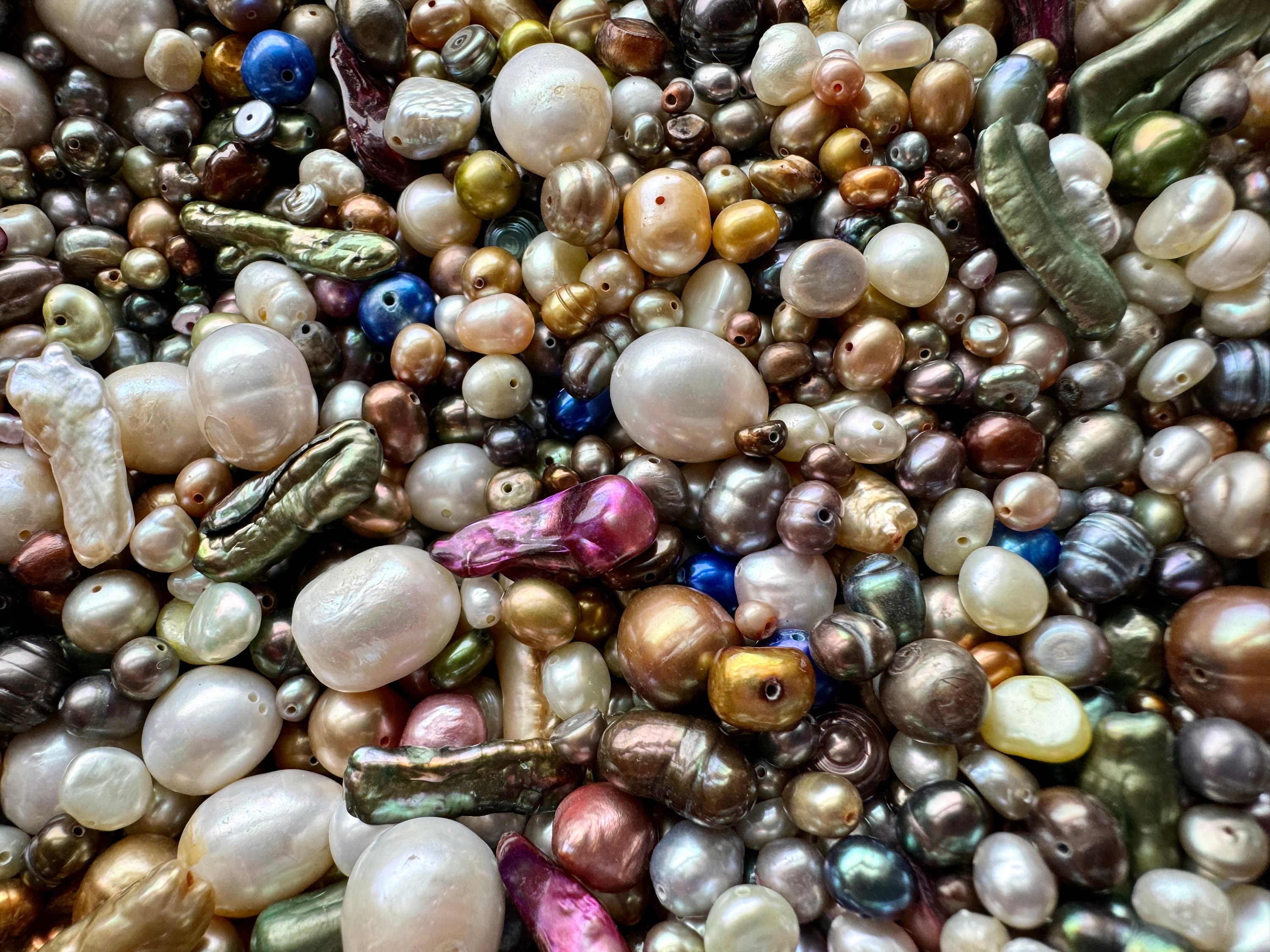 Yummy assorted mix of freshwater pearls! Sold per stuffed baggie (1.5 by 2 inches). SKU 16021