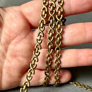 Gorgeous vintage well made specialty chain. Darker patina on this brass chain. Sold per yard. SKU chain500