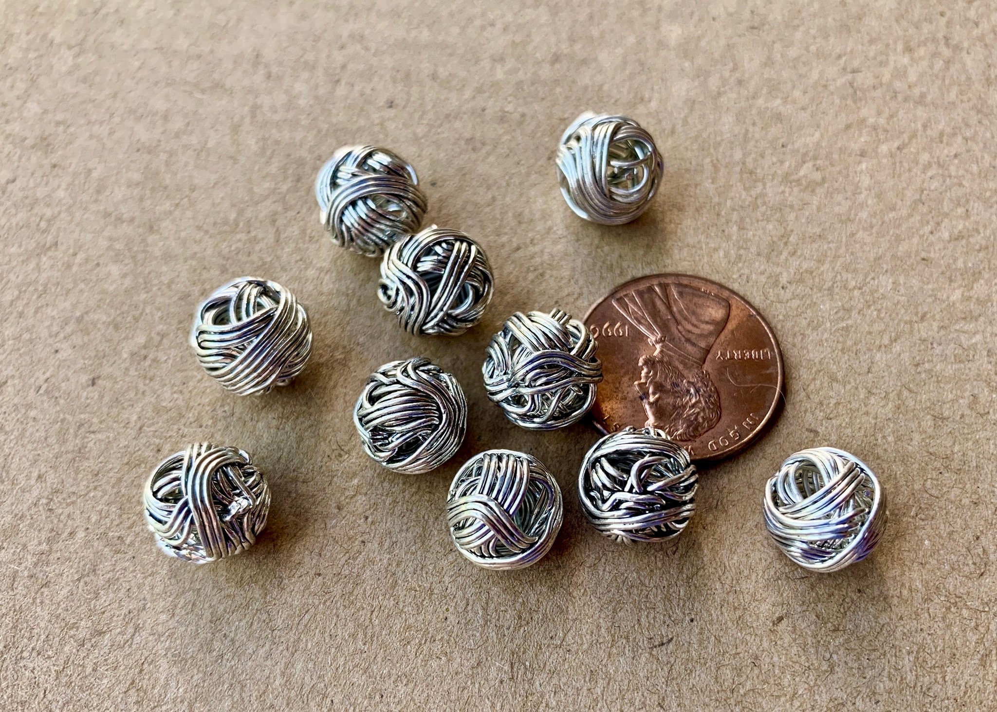 Very Interesting Coiled Wire Beads. Reminds Me of a Ball of Yarn