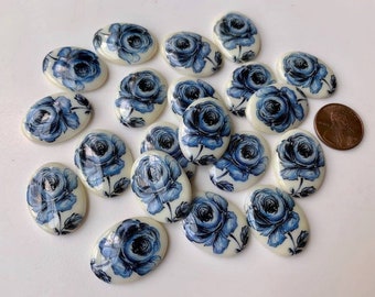 Vintage glass cabochons in a floral design! Sold per pair. SKU 00515