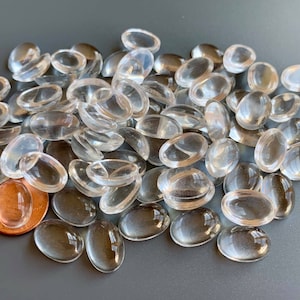 Lovely clear glass cabochons! Perfect for reverse painting, decoupaging an image below....and so much more! Sold per 12 pieces. SKU 01133