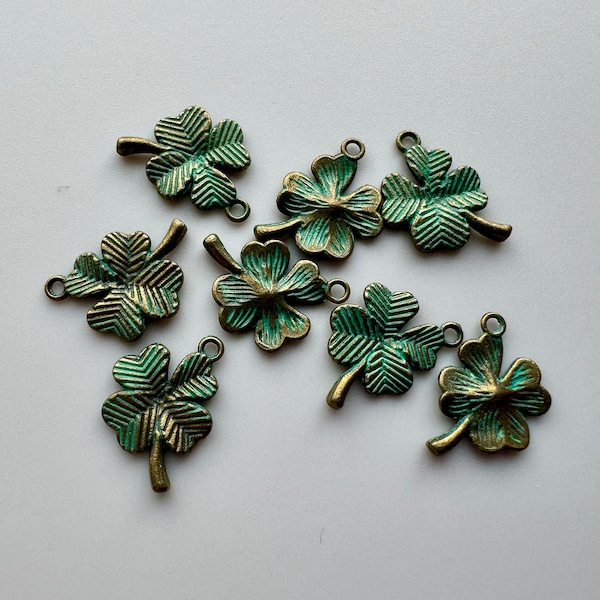 Gorgeous powder green finished four leaf clover/shamrock charms!