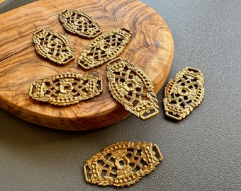 Vintage quality brass filigree component. Very well made and versatile. Sold per piece. SKU 16312