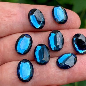 INCREDIBLE color in these vintage glass cabochons! Gold foiled backs and faceted fronts!!
