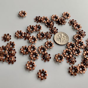 I love love love these vintage brass flower stampings! Perfect for layering with pearls and crystals and so much more!