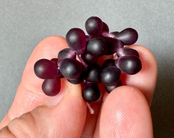 Gorgeous Czech pressed glass teardrops in matte transparent deep amethyst. Sold per strand/lot of 25 beads. SKU 16121