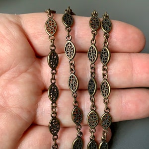 Gorgeous antique brass chain!!! Love the filigree links! Sold per one yard piece. SKU chain253