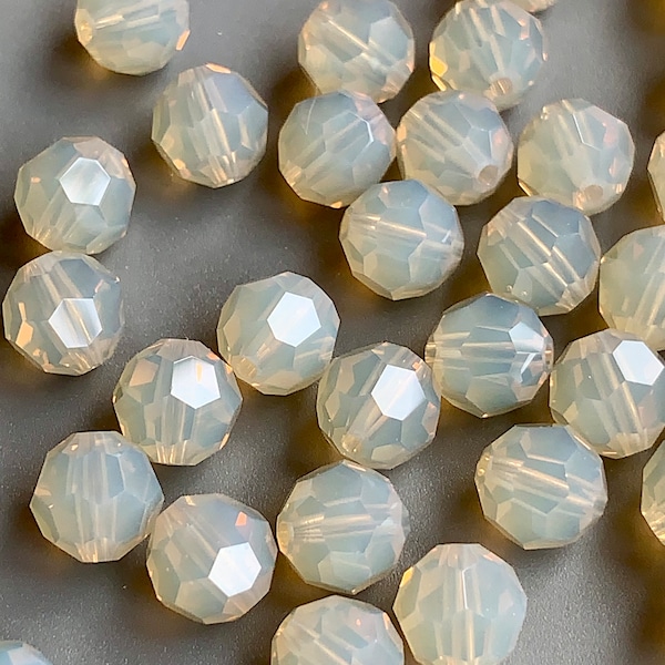 Gorgeous, brand new in the box! Sand Opal Swarovski rounds!